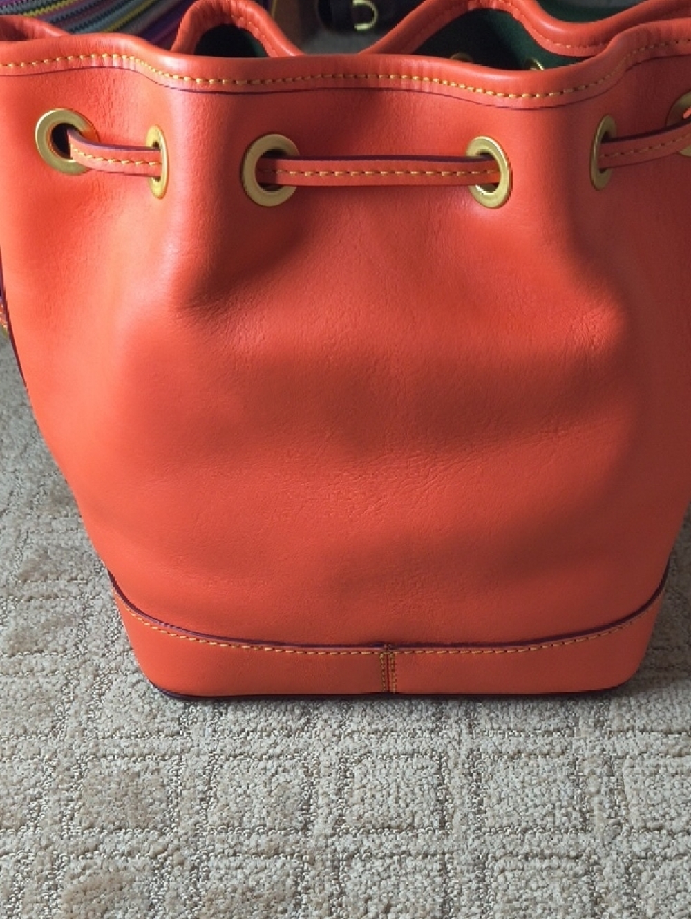 Dooney & Bourke Orange Florentine Leather Tassel Drawstring Bucket Bag - Picture 9 of 11
